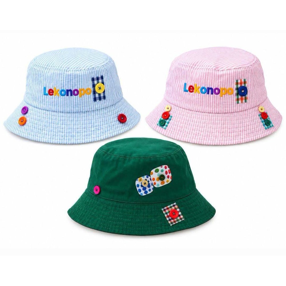 Three corduroy bucket hats in pale blue, pink and green